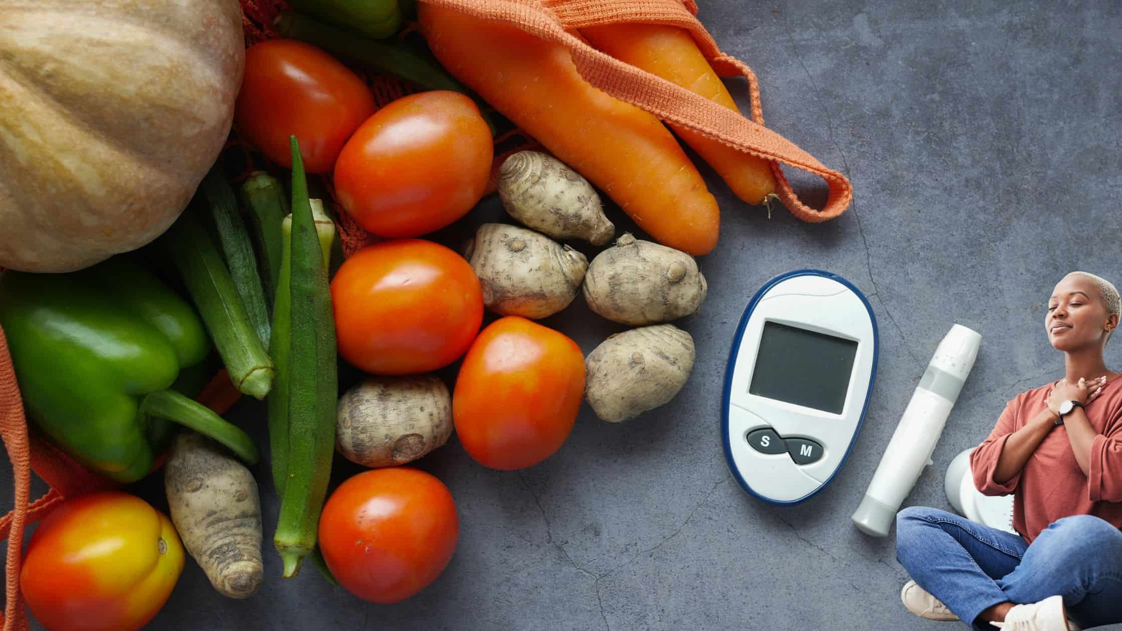 Fresh vegetables including tomatoes, carrots, bell peppers, ginger, okra, and yam on a textured surface for healthy eating.